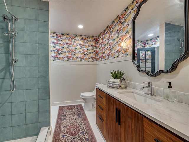 6401 Saddleback Dr, Oklahoma City, OK 73150 - full bath featuring wallpapered walls, vanity, tiled shower, toilet, and baseboards