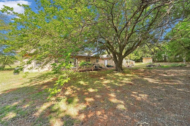 11402 N 1957th Rd, Elk City, OK 73644 - view of yard with a storage unit and an outdoor structure