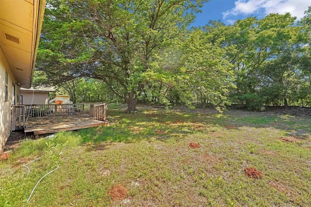 11402 N 1957th Rd, Elk City, OK 73644 - view of grassy yard with a wooden deck