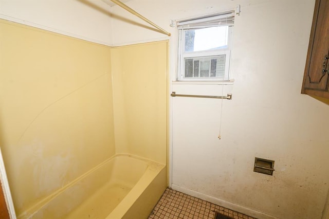 bathroom featuring tile patterned flooring