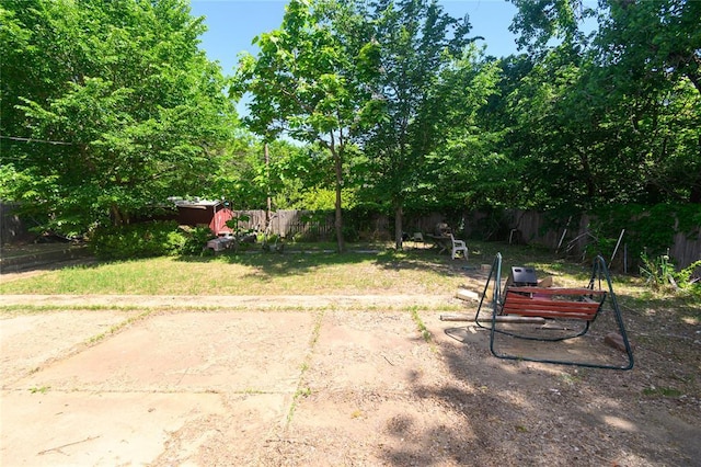 view of yard featuring fence