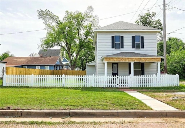 312 S Ash St, Guthrie, OK 73044 - view of front of home featuring covered porch and roof with shingles