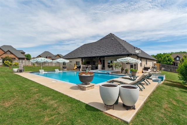 view of pool featuring a patio, an in-ground hot tub, and exterior bar