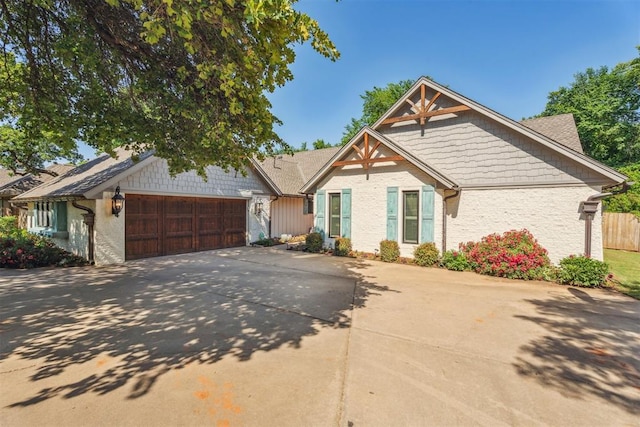 view of front of home with a garage and concrete driveway