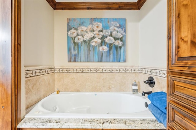 bathroom with a whirlpool tub