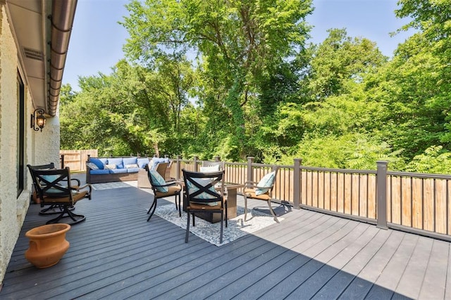 deck with an outdoor hangout area