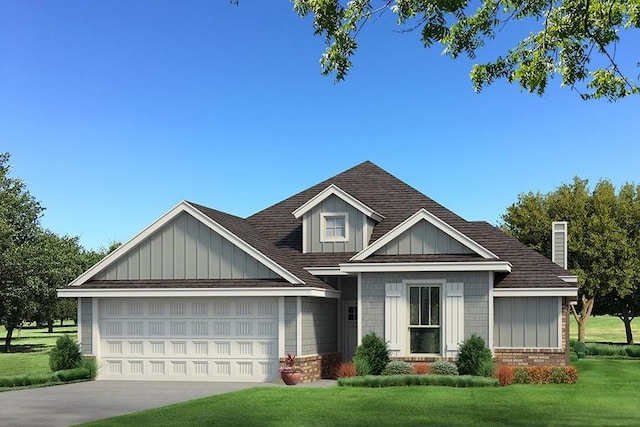 craftsman-style home with board and batten siding, a front yard, an attached garage, driveway, and brick siding