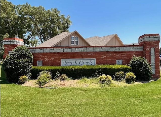 20648 Brush Creek Blvd, Harrah, OK 73045 - community sign featuring a lawn