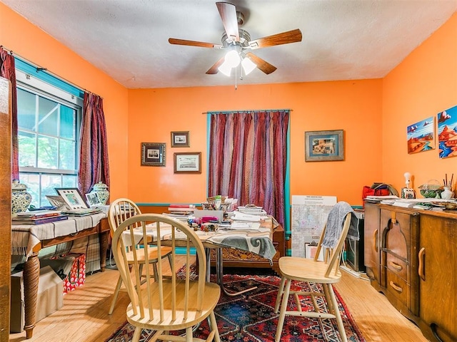 2321 Cashion Pl, Oklahoma City, OK 73112 - dining room with wood finished floors and a ceiling fan
