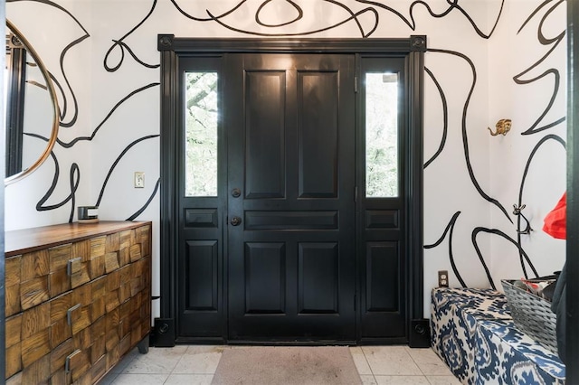 entrance foyer with light tile patterned floors