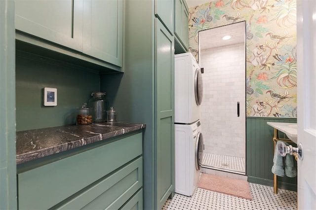 laundry room featuring stacked washer and clothes dryer