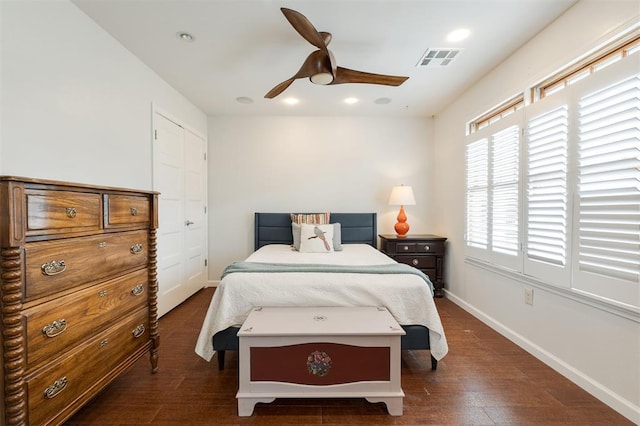 bedroom featuring dark wood-type flooring, baseboards, recessed lighting, and ceiling fan