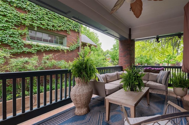 balcony with ceiling fan and outdoor lounge area