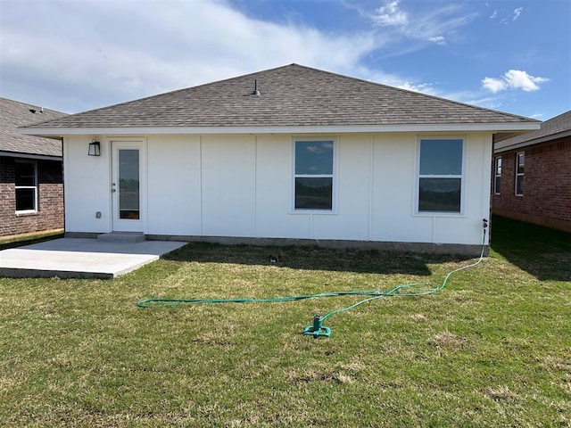 2933 NW 196th Pl, Edmond, OK 73012 - back of house with roof with shingles and a yard