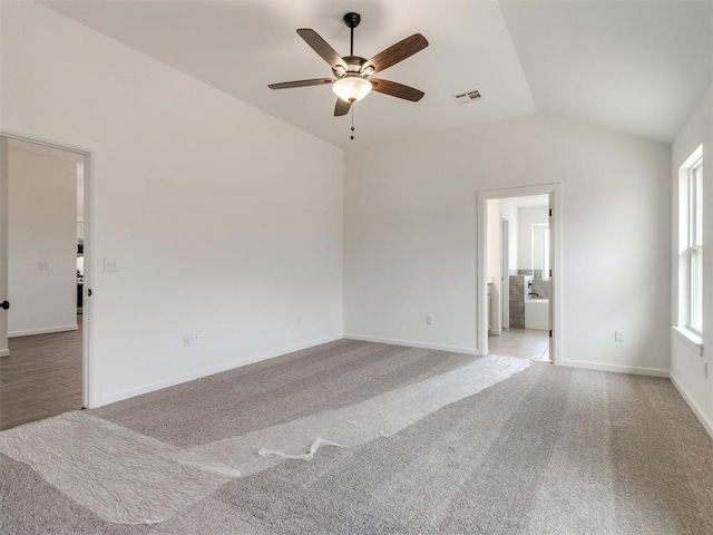 959 SE 16th Ter, Newcastle, OK 73065 - empty room with vaulted ceiling, a ceiling fan, carpet flooring, and baseboards