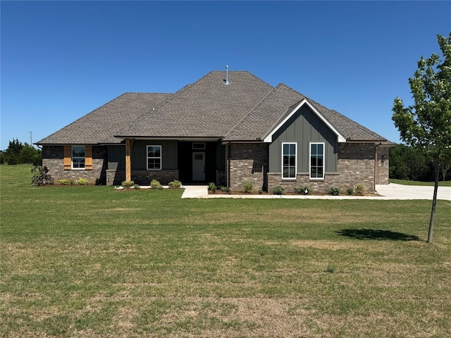 9596 Regado Ct, Guthrie, OK 73044 - craftsman house with a front yard, board and batten siding, and a shingled roof