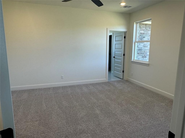 9596 Regado Ct, Guthrie, OK 73044 - carpeted empty room with baseboards and ceiling fan