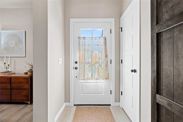 2803 Redwood Ct, Newcastle, OK 73065 - doorway with light wood-type flooring and baseboards