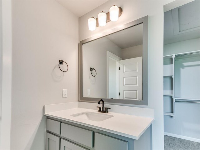 929 SE 16th Ter, Newcastle, OK 73065 - bathroom with vanity and baseboards
