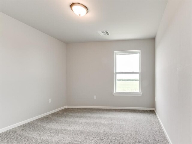 929 SE 16th Ter, Newcastle, OK 73065 - carpeted spare room with baseboards