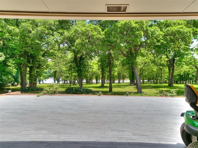 view of community featuring a lawn