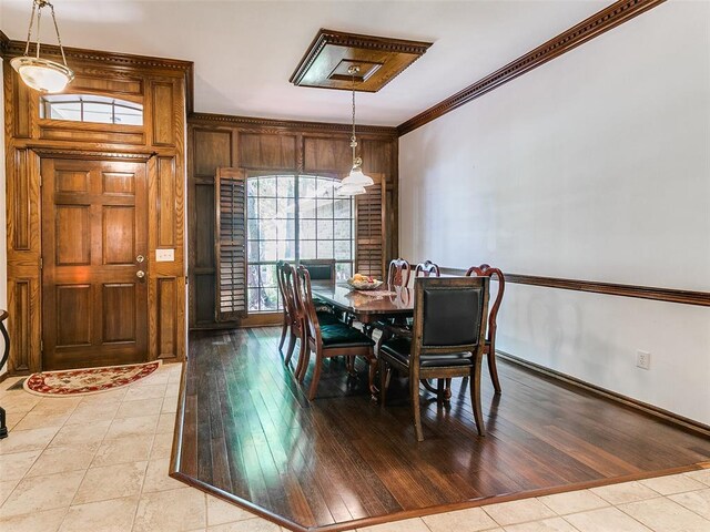 13974 S Broadway St, Edmond, OK 73034 - dining space featuring light tile patterned flooring, crown molding, and baseboards