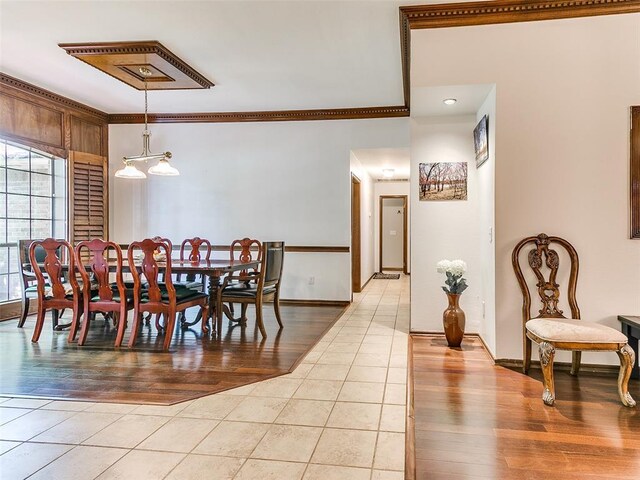 13974 S Broadway St, Edmond, OK 73034 - dining area with light wood-style floors, ornamental molding, and baseboards