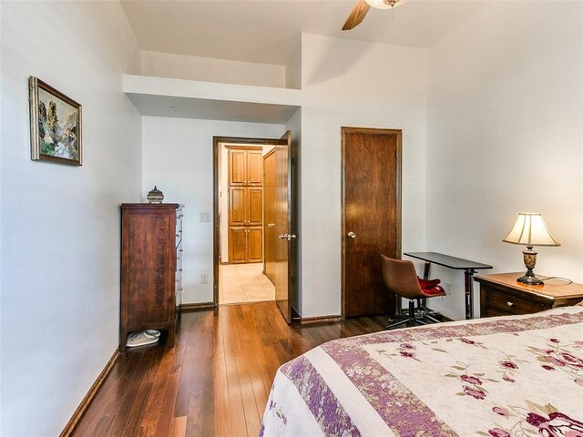 13974 S Broadway St, Edmond, OK 73034 - bedroom featuring hardwood / wood-style floors and baseboards