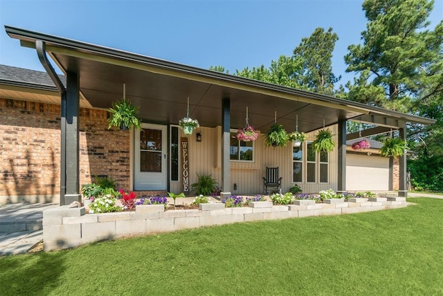 125 Creek Hollow Dr, Choctaw, OK 73020 - doorway to property with a lawn, a porch, and brick siding