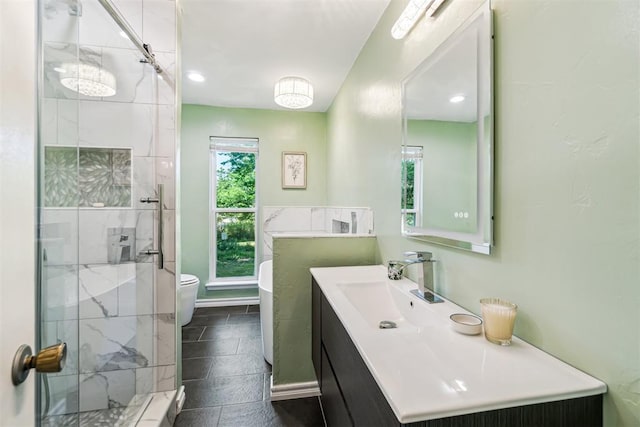 125 Creek Hollow Dr, Choctaw, OK 73020 - bathroom featuring a stall shower, vanity, toilet, and recessed lighting