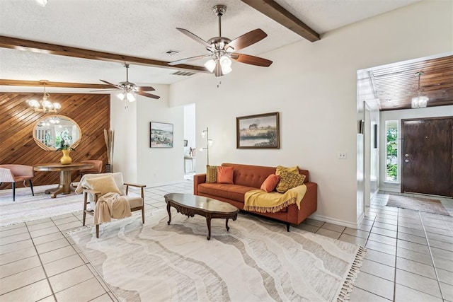 125 Creek Hollow Dr, Choctaw, OK 73020 - living room featuring light tile patterned floors, a ceiling fan, baseboards, wooden walls, and beamed ceiling