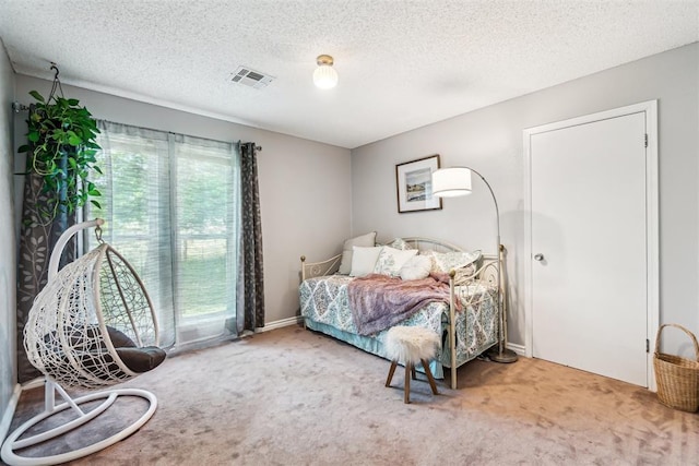 125 Creek Hollow Dr, Choctaw, OK 73020 - carpeted bedroom featuring a textured ceiling