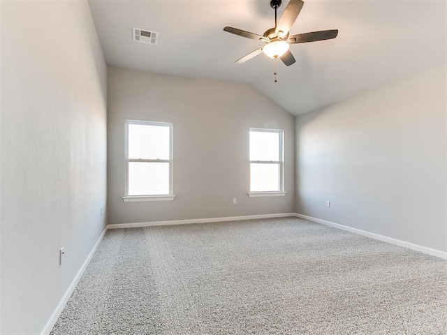 8617 NW 77th St, Oklahoma City, OK 73132 - carpeted empty room featuring a ceiling fan, lofted ceiling, and baseboards