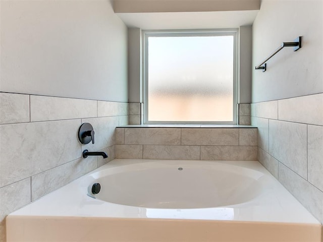 8617 NW 77th St, Oklahoma City, OK 73132 - bathroom with healthy amount of natural light and a bath