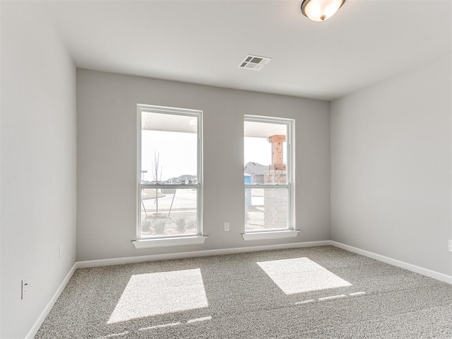 8617 NW 77th St, Oklahoma City, OK 73132 - unfurnished room with carpet and baseboards