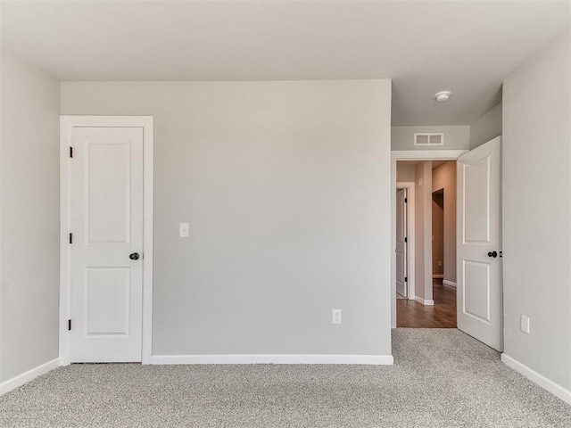 8617 NW 77th St, Oklahoma City, OK 73132 - unfurnished room featuring carpet flooring, baseboards, and a smoke detector