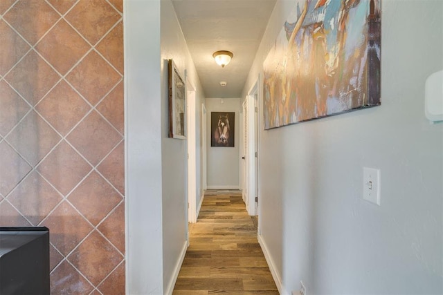 2316 E 68th St, Stillwater, OK 74074 - corridor with wood finished floors and baseboards
