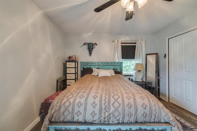 2316 E 68th St, Stillwater, OK 74074 - bedroom featuring wood finished floors, ceiling fan, and baseboards