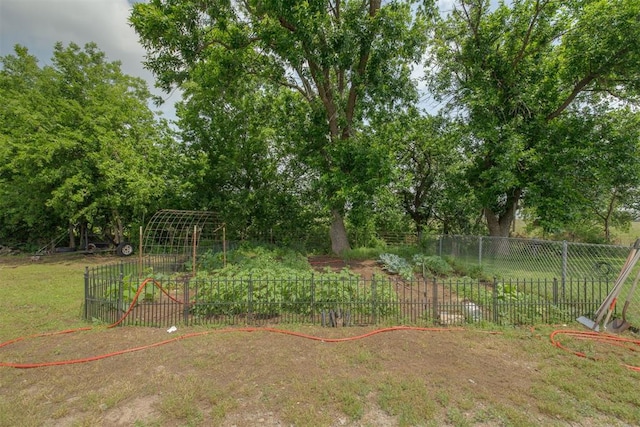 2316 E 68th St, Stillwater, OK 74074 - view of yard with a vegetable garden