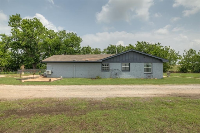 2316 E 68th St, Stillwater, OK 74074 - back of house featuring a yard