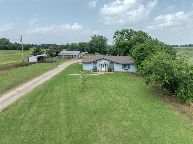 2316 E 68th St, Stillwater, OK 74074 - view of front of home with driveway and a front yard