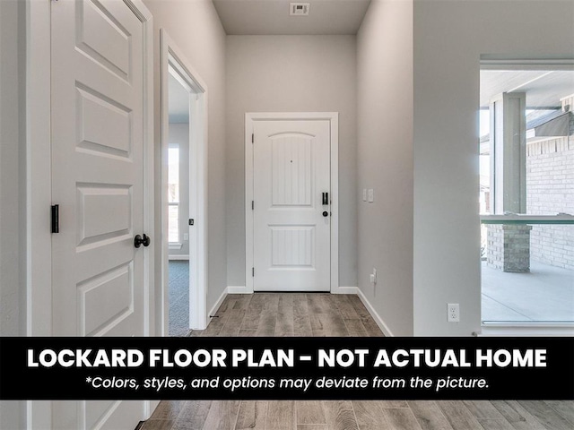 8609 NW 76th St, Oklahoma City, OK 73132 - foyer entrance with wood finished floors and baseboards