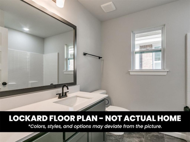8609 NW 76th St, Oklahoma City, OK 73132 - full bathroom featuring toilet, healthy amount of natural light, and vanity