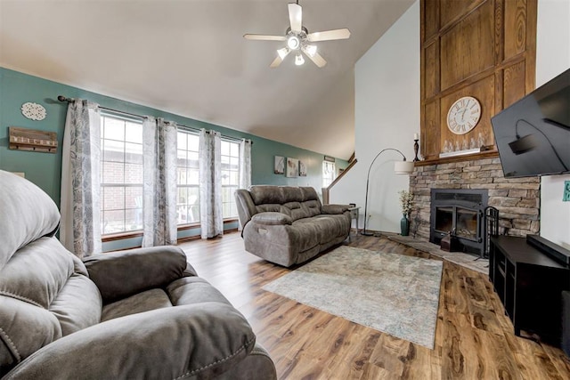 1312 SW 25th St, Moore, OK 73170 - living room with a ceiling fan, wood finished floors, and high vaulted ceiling