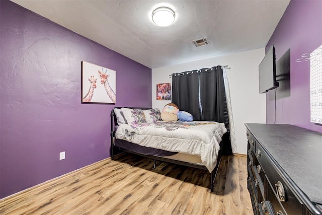 1312 SW 25th St, Moore, OK 73170 - bedroom with wood finished floors