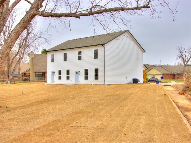 2812 Shoreridge Ave Unit 2812, Norman, OK 73072 - rear view of house with fence and central AC