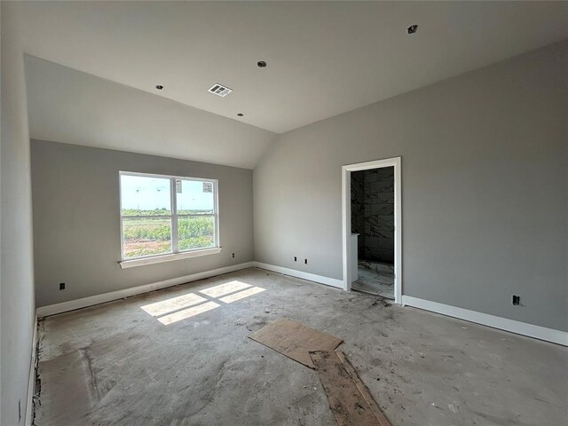 14101 Giverny Ave, Yukon, OK 73099 - unfurnished room featuring vaulted ceiling and baseboards