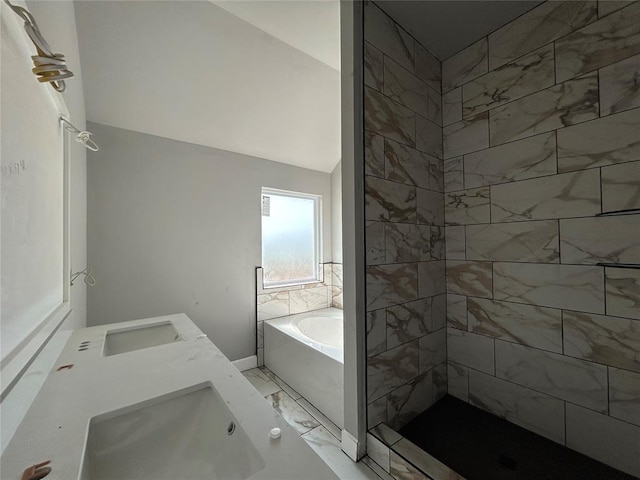 14101 Giverny Ave, Yukon, OK 73099 - full bathroom with marble finish floors, a garden tub, double vanity, and a shower
