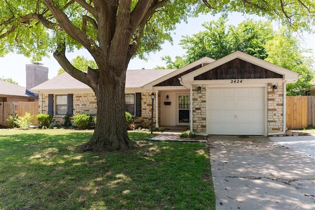 2424 Ashley Dr, The Village, OK 73120 - ranch-style home with stone siding, driveway, and an attached garage