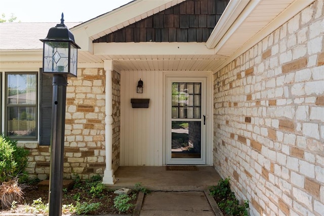 2424 Ashley Dr, The Village, OK 73120 - view of exterior entry featuring stone siding